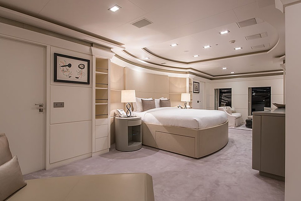 Glam: In the master suite the stylish and compatary decor - which is believed to have been updated in 2016 - continues, with a huge bed covered in white bed linen and a beige leather chaise longues